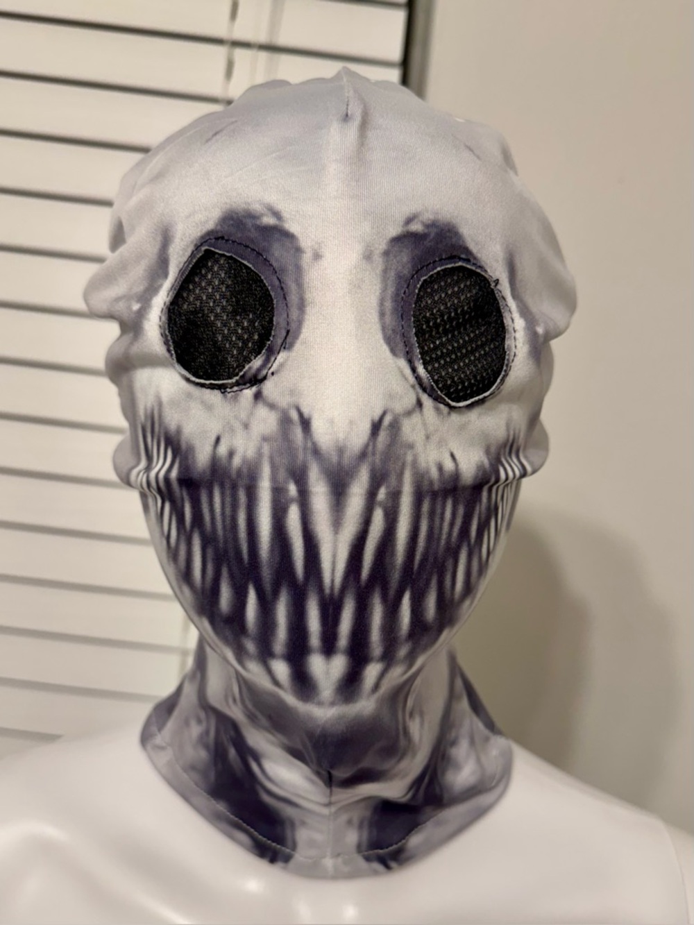 "The Rake" — a balaclava designed to mimic the appearance of the character